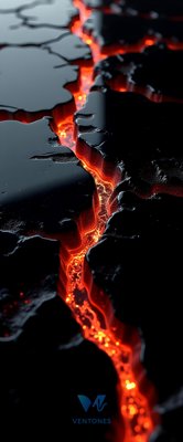Molten Lava River Through Dark Volcanic Rock Cracks